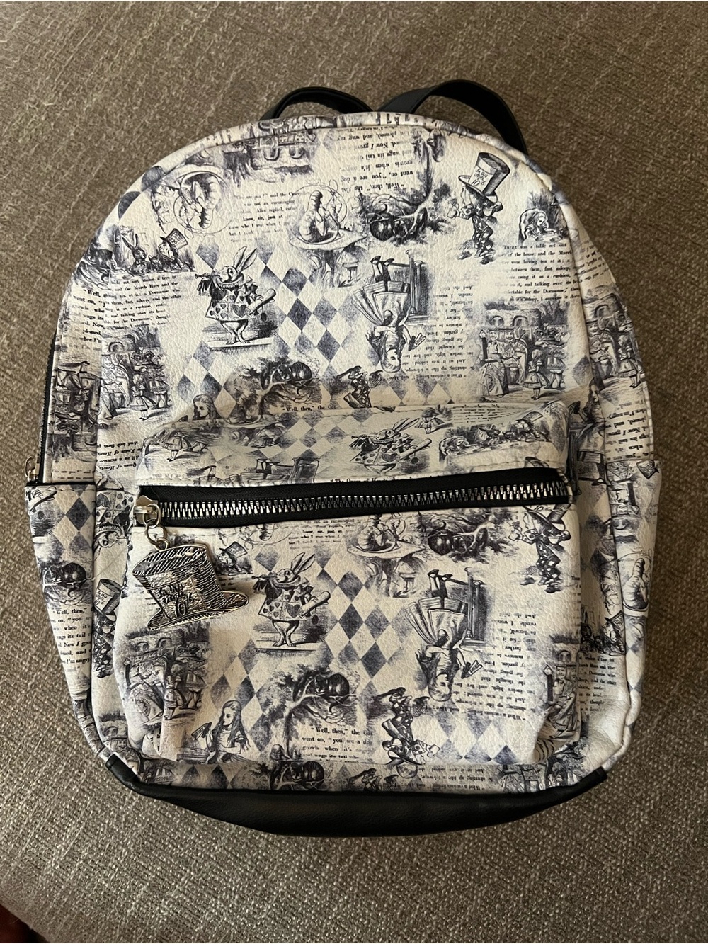 Alicein Wonderland Printed White & Black Canvas Backpack. Fun for anyone!